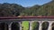 Aerial of train on viaduct in Semmering railway, Austria