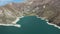 Aerial: tranquil beauty of alpine lake with turquoise water