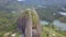 Aerial traveling in of Peck of Guatape, a large granite rock