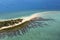 Aerial tropical sand island and reef