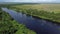 AERIAL TRUCK BACK Revealing River Canal In The Orinoco Delta, Venezuela