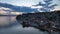 Aerial Twilight drone view of Ohrid City at Night in North Macedonia. Old Town on Ohrid lake with a beautiful fortress