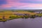 Aerial from a typical dutch landscape with windmills, water en far views