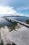 aerial ultra-wide panoramic view on the concrete highway bridge across the coastline.