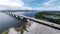 aerial ultra-wide panoramic view on the concrete highway bridge across the coastline.