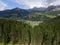 Aerial of Val Gardena from Ciampinoi in GrÃ¶den. Stevia and Seceda in the Background and Forest and Trees in the foreground.