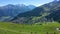 Aerial of Verbier switzerland, Val de Bagnes, lateral traveling - Aerial 4K with mountainbikers in the foreground