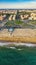 Aerial vertical panorama of Lido di Ostia famous Italian sandy beach and cityscape. Mediterranean resort for travel and