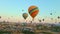 Aerial video. Captured against the canvas of the Cappadocian sky, this video showcases the enchanting spectacle of a hot
