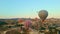 Aerial video. Captured against the canvas of the Cappadocian sky, this video showcases the enchanting spectacle of a hot