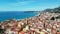 Aerial video of colorful bright buildings on the sea shore, Menton Commune in France