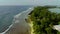 Aerial video of a drone flying over a picturesque beach