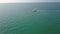 Aerial video with drone over the sea and the beach with boats and yachts