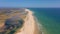 Aerial video filming by drone of the marine reserve Ria Formosa Faro Portugal Algarve. Ilha Deserta. Flight over the