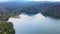 Aerial video of a great lake surrounded by forest