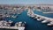 Aerial video of luxury yachts and boats. Marina bay