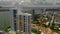 Aerial video Miami Beach bay-front condos and construction cranes