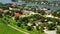 Aerial video Miami Beach luxury homes between golf course and water