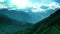 Aerial video of mountains. Blue sky with dramatic clouds