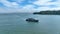 Aerial video outside Tiburon with yacht sailing across water