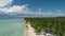 Aerial video over tropical island beach Punta Cana, Dominican Republic. Palm trees and white sand