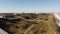 Aerial video rising over dunes reveal vacation homes Crescent Beach Florida USA