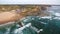 Aerial video shooting. Monte Clerigo surf beach on the Atlantic coast. Portugal, Aljezur, Sagres, Algarve, next to the