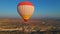 In this aerial video, the skies above Cappadocia, Turkey, come alive with a kaleidoscope of hot air balloons