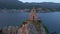 Aerial video. The Sveta Nedelja - Christian church on a tiny island in the sea close to the city of Petrovac Lots of