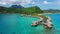 Aerial video of Tropical vacation paradise island overwater bungalows Bora Bora