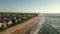 Aerial video Wrightsville Beach and Johnnie Mercers Fishing Pier 4k