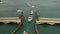 Aerial video yachts waiting to pass under a drawbridge in Miami Beach