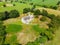 Aerial view of a 12th century Norman church St Mary's Stainburn in North Yorkshire