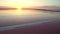 Aerial view 4k. Fabulous sunset at the dead salt sea. Pink salt brine.