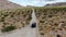 Aerial view of 4x4 car driving off road in the desert. Joshua Tree