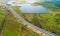 Aerial view of A1 Transylvania Highway between Sibiu and Sebes with spectacular viaduct bridge and passage route, roads of Romania