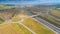 Aerial view of A1 Transylvania Highway between Sibiu and Sebes with spectacular viaduct bridge and passage route, roads of Romania