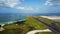 Aerial view of abandoned airport, plane landing on runway. Drone shot 4k. Aircraft landing on International airport