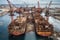 aerial view of abandoned dockyard with rusty cranes