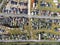 Aerial view of an abandoned junkyard with vehicles parked in a parking lot in Carnide, Lisbon, Portugal