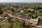 Aerial view of abandoned Kuldiga town match factory and wood processing company Vulkans, Latvia