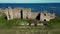 Aerial view of abandoned medieval castle along the sea coast. ruins in Estonia