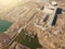 Aerial view of abandoned and ruined Nuclear Power Plant and small cooling ponds, post apocalyptic atmosphere