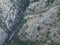 Aerial view of abandoned stoned houses and mills with mechanical press in Mani area at Ridomo Gorge. Natural scenery from the