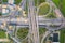 Aerial View Above of Busy Highway Road Junctions at day. The Intersecting Freeway Road Overpass The Eastern Outer Ring Road of