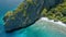 Aerial view above coral reef and tourist banca boats on Entalula beach, Bacuit Bay, El-Nido. Palawan Island, Philippines