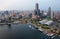 Aerial view above Kaohsiung Harbor at sunset, a vibrant seaport in Southern Taiwan, with landmark 85 Sky Tower