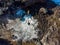 Aerial view from above at a Nakalele blowhole after water eruption, Maui, Hawaii.