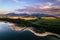 Aerial view from above the water surface of Liptovska Mara water reservoir on serene nature landscape, the Low Tatras in