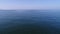 Aerial view, advance in of calm, blue sea